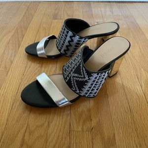 Expression sandals.  Size 8.5. Mirror heel.  Never worn.